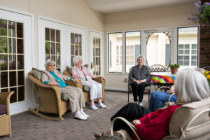 Group of Seated Woman Smiling Together