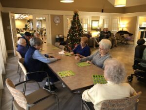 Group of People Playing Bingo Together