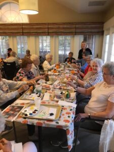 Large Group of Woman Painting Together