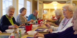 Group of Woman Painting at Table