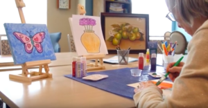 Woman Painting at an Art Class