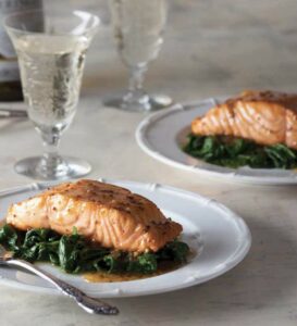 Salmon Plated on Table Next to Water